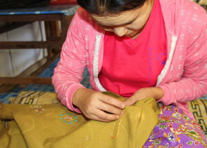 Karenni refugee woman embroiderer